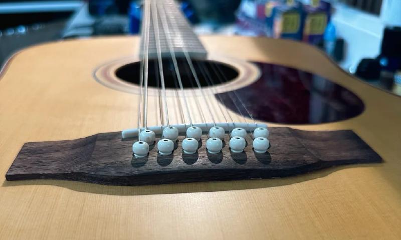 Featured image of post 12 Strings, 12 Insights: Essential Maintenance Tips for Your Guitar